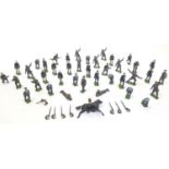 Toys: A quantity of Britains Ltd. hand painted lead military figures / toy soldiers, to include