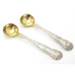 A pair of Victorian Scottish silver salt / mustard spoons with gilded bowls. Hallmarked Edinburgh