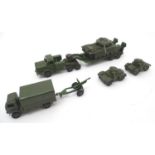 Toys: A quantity of Dinky Toys die cast scale model military vehicles comprising Dinky Supertoys