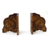 A pair of 20thC bookends with carved fish detail. Approx. 8" long (2) Please Note - we do not make