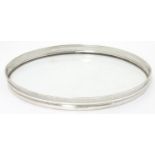 A glass and silver plate tray of oval form with pierced galleried sides. 12" wide Please Note - we