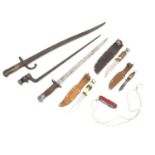 Militaria: three early 20thC bayonets, comprising a French Yataghan sword bayonet, a socket