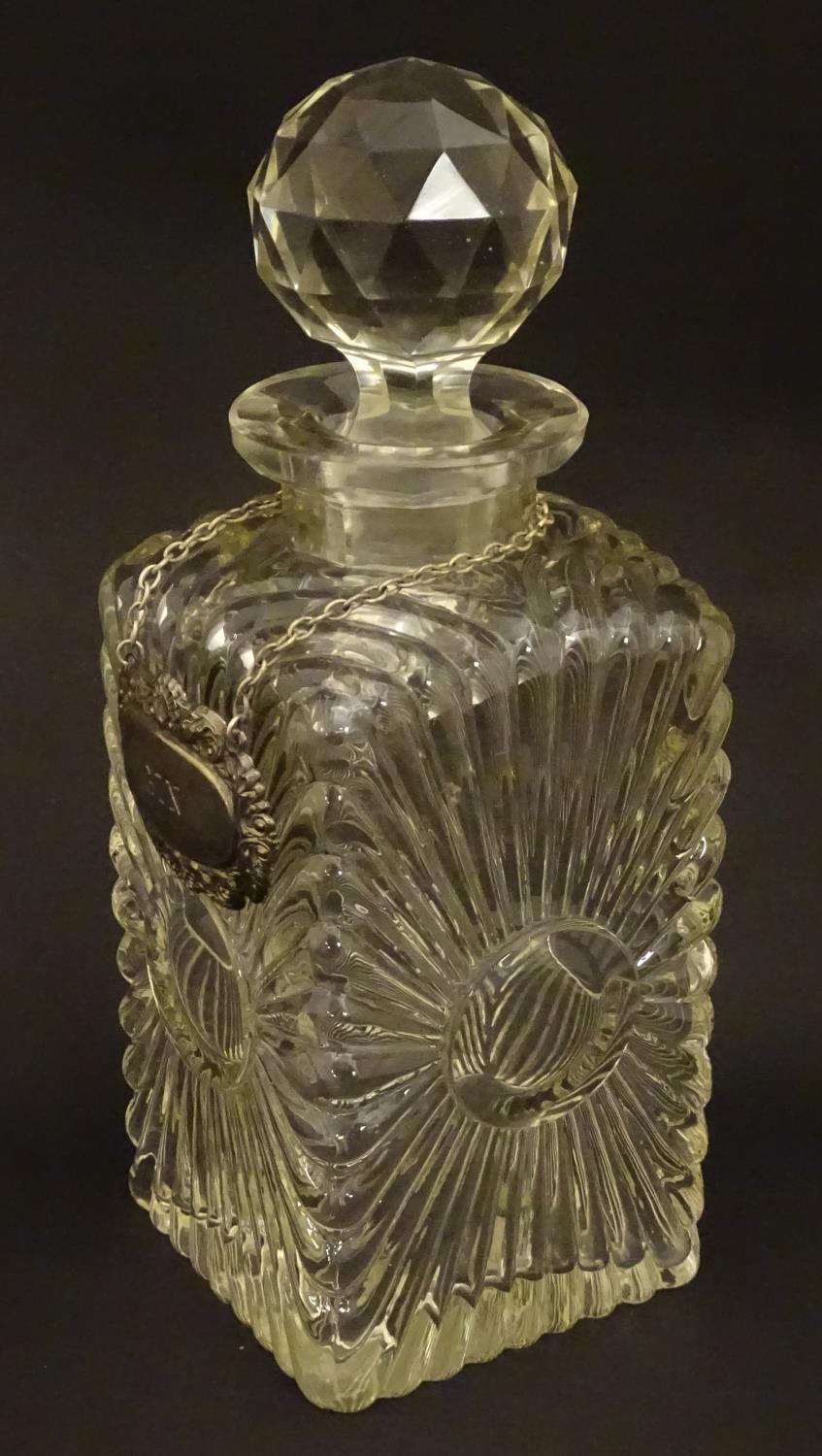 An early 20thC glass decanter of squared form. Together with a silver plate wine label / bottle - Image 3 of 7