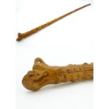 A 20thC hawthorn cane / stick with carved horse finial and lacquered finish. Approx. 40" Please Note