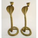 A pair of 20thC Indian brass candlesticks formed as cobras / snakes. Approx. 15 1/4" high (2) Please