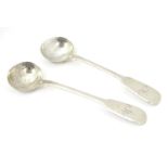 A pair of Geo IV silver fiddle pattern salt spoons. Hallmarked London 1828 maker Thomas Dicks.
