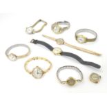 Assorted ladies watches to include: A mid 20thC Tudor 9ct gold cased watch, together with two 9ct