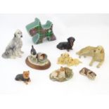 A quantity of Border Fine Arts models of dogs comprising Gold Retriever Lying, no. BO439, Black Roan