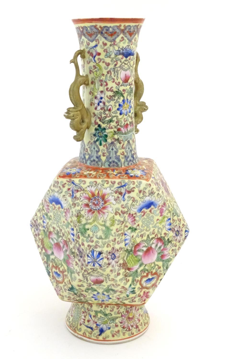 A Chinese famille jaune vase with twin handles modelled as stylised dragons, the body decorated with - Image 5 of 7