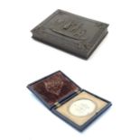 A Victorian Union Case daguerreotype / ambrotype hinged photograph case, with relief decoration