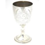 A silver trophy cup of goblet / chalice form. Hallmarked Sheffield 1897 maker Jenkins & Timm. 7 3/4"