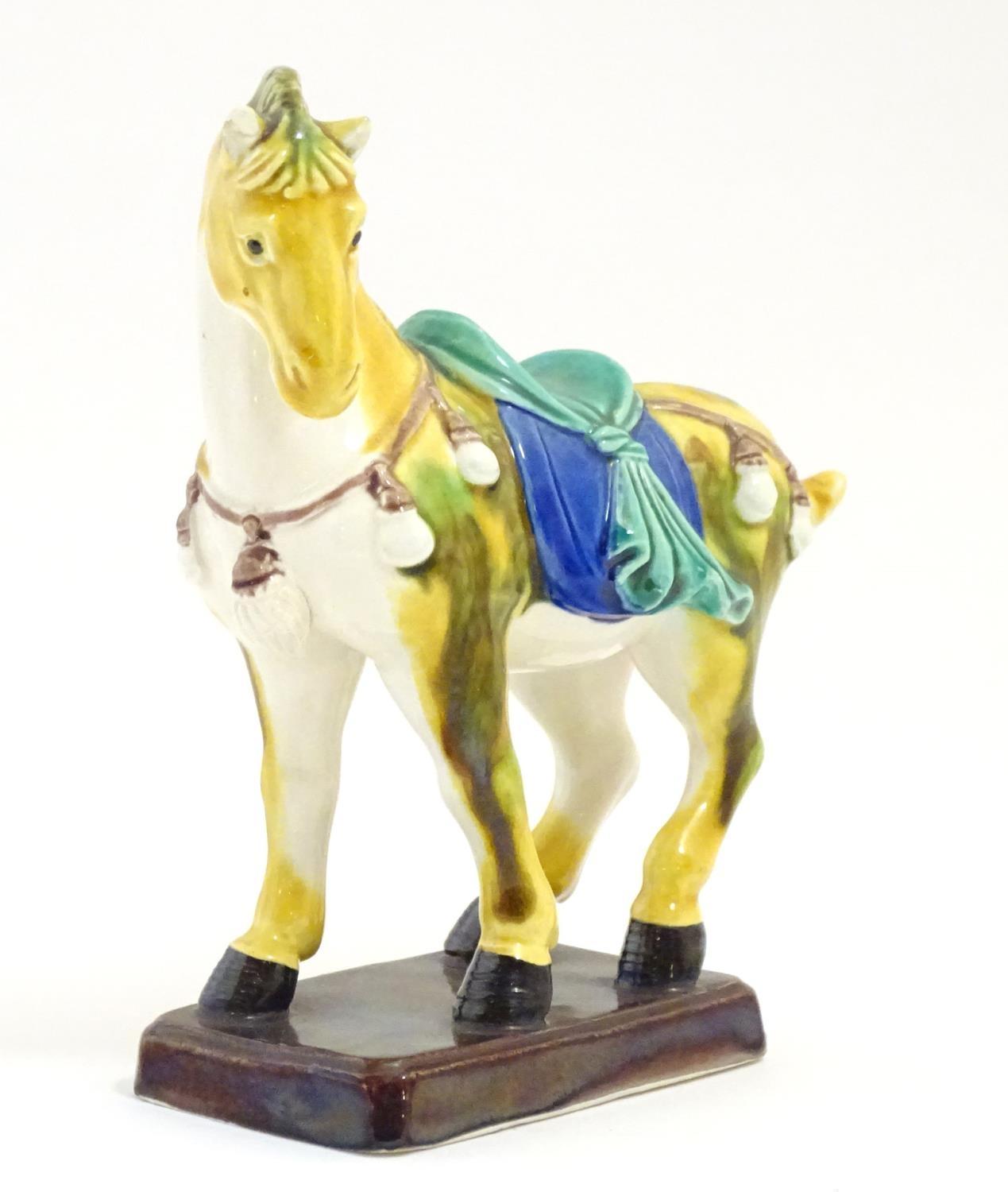 A Chinese model of a Tang style horse. Approx. 5 3/4" Please Note - we do not make reference to - Image 3 of 6