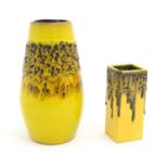 Two West German vases with a yellow ground and a lava glaze. Marked under. Largest approx. 9 3/4"