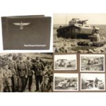 Militaria: a WWII/WW2/Second World War German photograph album, the cover with Reichsadler,