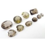 Assorted facet cut smoky quartz stones. unmounted. The largest approx 1" long. (10) Please Note - we