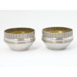 A pair of American Sterling silver salts with gilded interiors. Maker Gorham Manufacturing Co. 1 3/
