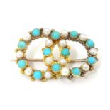 A Victorian gold and gilt metal brooch set with turquoise and seed pearls 1 1/2" wide Please