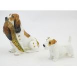 Two Royal Doulton models of dogs comprising a Spaniel with Pheasant, no. HN 1028, and a Sealyham