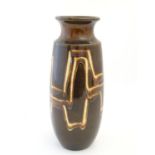 A West German vase by Scheurich. Marked under. Approx. 16 1/4" high Please Note - we do not make