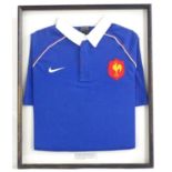 Rugby Union: a framed France national team shirt, bearing the signature of Jean Pierre Rives (Casque