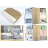 A 20thC postcard album with a variety of postcards to include commemorative postcards depicting