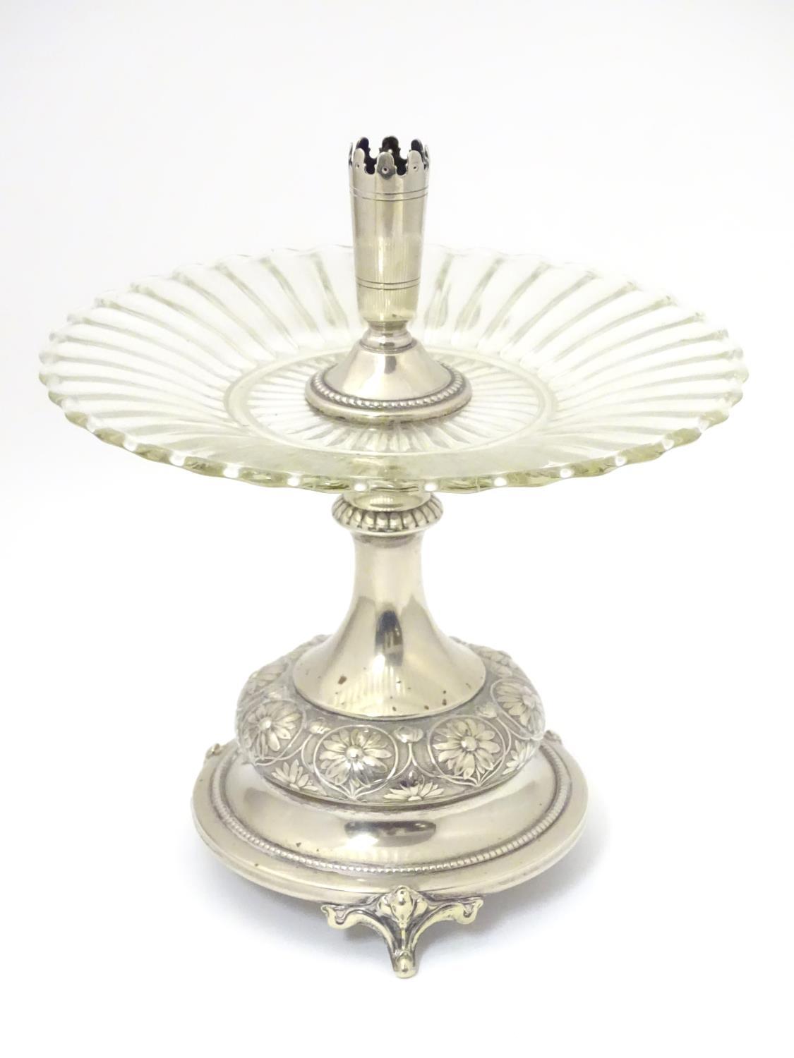 A late 19thC / early 20thC silver plate and glass centre piece with provision for epergne glass