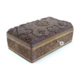 A Kashmiri style jewellery box with carved floral detail, monogrammed to interior of lid. Approx.