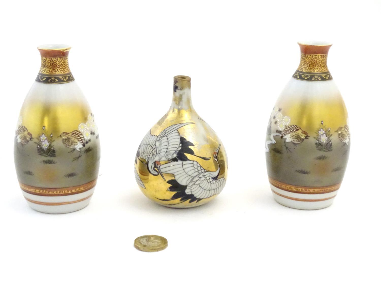 Three Japanese vases, comprising a pair decorated with a landscape scene with quail birds and - Image 2 of 11