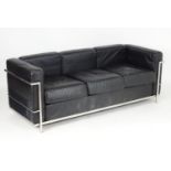 A mid 20thC chrome and leather Le Corbusier LC3 sofa. 70" long x 26" wide x 25" high. Please