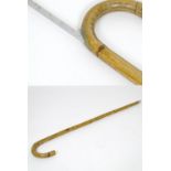 Equestrian sports: a 20thC horse measuring walking stick, the bamboo shank with expanding rule (17