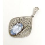 Fahrner Theodor : A 20thC silver pendant set with aquamarine stone and marcasite detail. marked TF