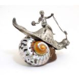 A 20thC novelty desk ornament modelled as a cherub riding the body of a snail with a shell base.