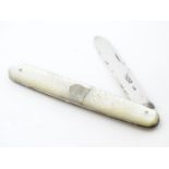 A Victorian folding fruit knife with mother of pearl handle and silver blade, hallmarked Sheffield