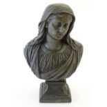A 20thC cast metal bust of the Virgin Mary, Our Lady of Sorrows, raised on a square, flared socle