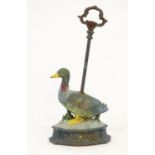 A 20thC cast door stop modelled as a duck with polychrome decoration. Approx. 19" high Please Note -