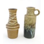 Two West German vases, comprising a single handled example with drip glaze detail, the a chimney