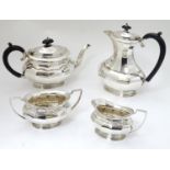 A silver plate 4 piece tea set comprising teapot, hot water pot, sugar and cream jug (4) Please Note