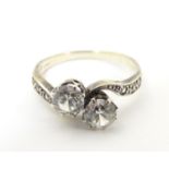 A vintage 9ct gold ring set with spinel in a crossover setting. Ring size approx N Please Note -