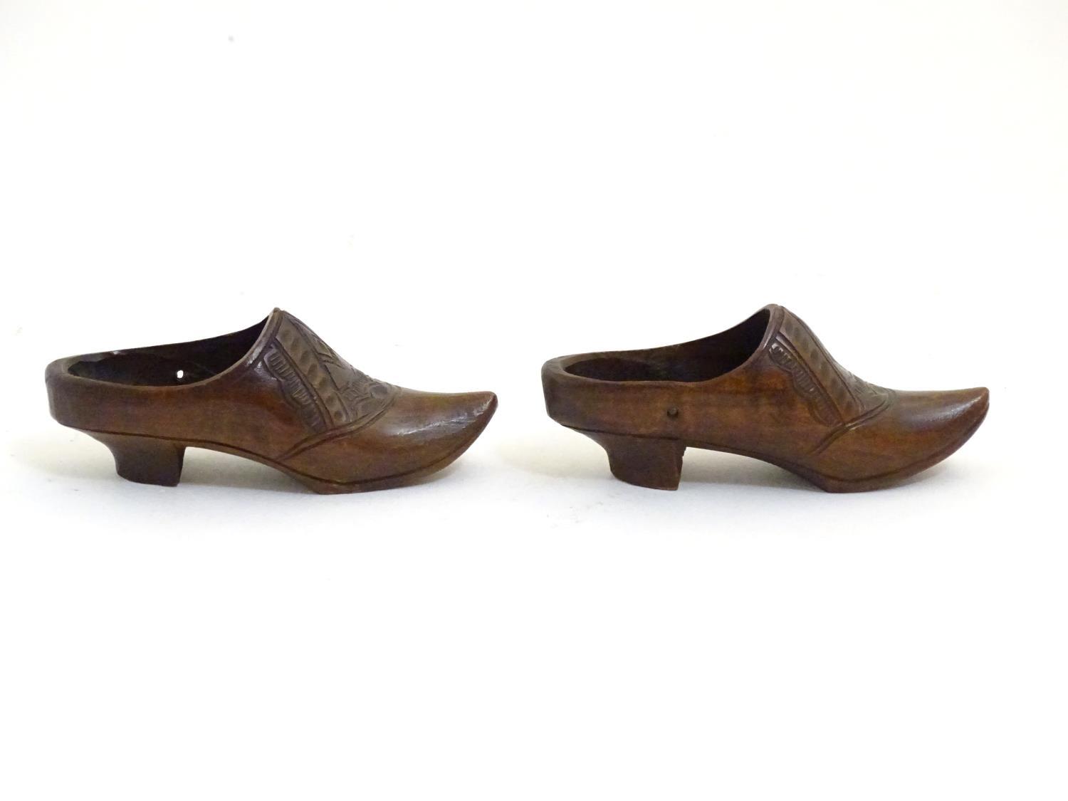 A pair of 20thC carved miniature clogs. Approx. 3 3/4" long (2) Please Note - we do not make - Image 4 of 6