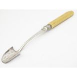 An early 20thC stilton scoop approx. 10" long Please Note - we do not make reference to the