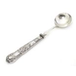 A silver handled king's pattern jam / preserve spoon with circular silver plated bowl. The handle