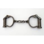 20thC steel handcuffs / wrist restraints marked JG 1941, to barrel. Please Note - we do not make
