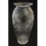 A cut glass / crystal vase with etched floral decoration 12" high Please Note - we do not make