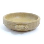 A Robert Thompson of Kilburn / Mouseman (1876-1955) oak nut bowl with an adzed exterior with