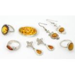 Assorted silver and white metal jewellery set with amber coloured cabochons etc Please Note - we