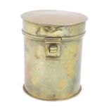 A brass canister of cylindrical form with hinged lid. 6" high Please Note - we do not make reference