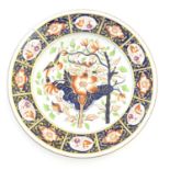 A Copeland hand painted plate in the Imari palette with floral, foliate and bird detail with gilt