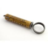 A vintage advertising corkscrew for ' Chapmans ' titled ' Chapmans Lemonade, stone Ginger beer,