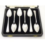 A cased set of 6 Art Deco silver grapefruit spoons, hallmarked Birmingham 1934-38, maker I.S.