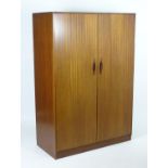 Vintage retro, mid-century: an afrormosia double wardrobe by Elliotts of Newbury, 48" wide, 25"